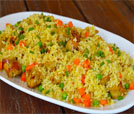 A delicious serving of rice and vegetables on a plate with a fork, exemplifying the best in Indian and Nepali dining.