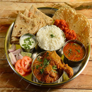 A beautifully presented plate of Indian food, highlighting the rich flavors and diversity of Indian and Nepali cuisine.